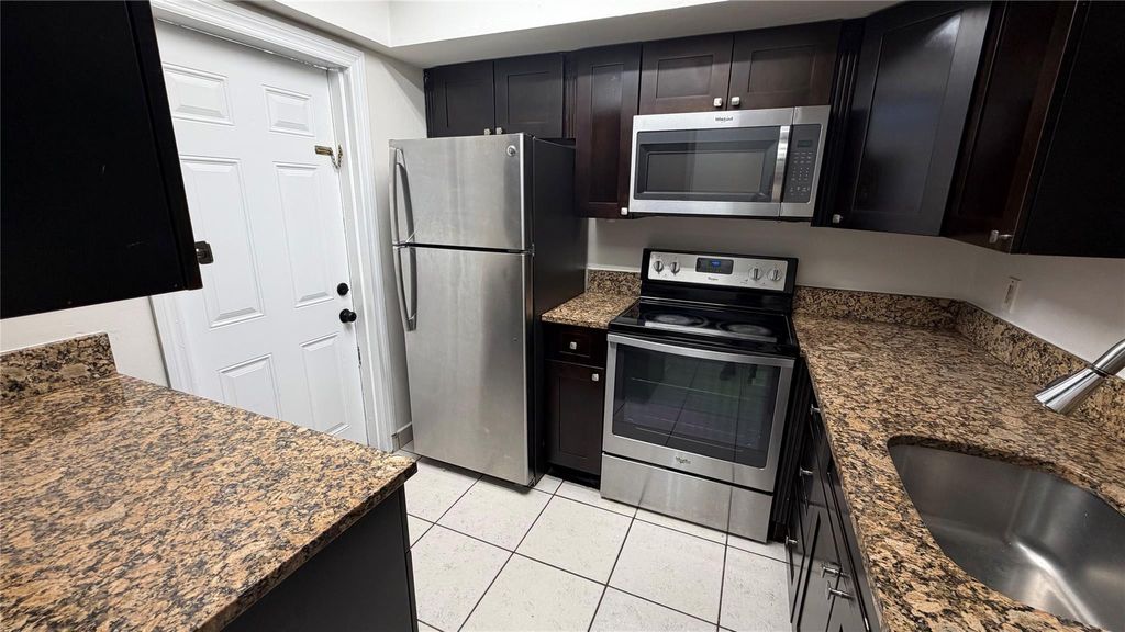 Photo of 4061 NW 9th Avenue #105, Deerfield Beach, FL 33064 (MLS # F10537817)