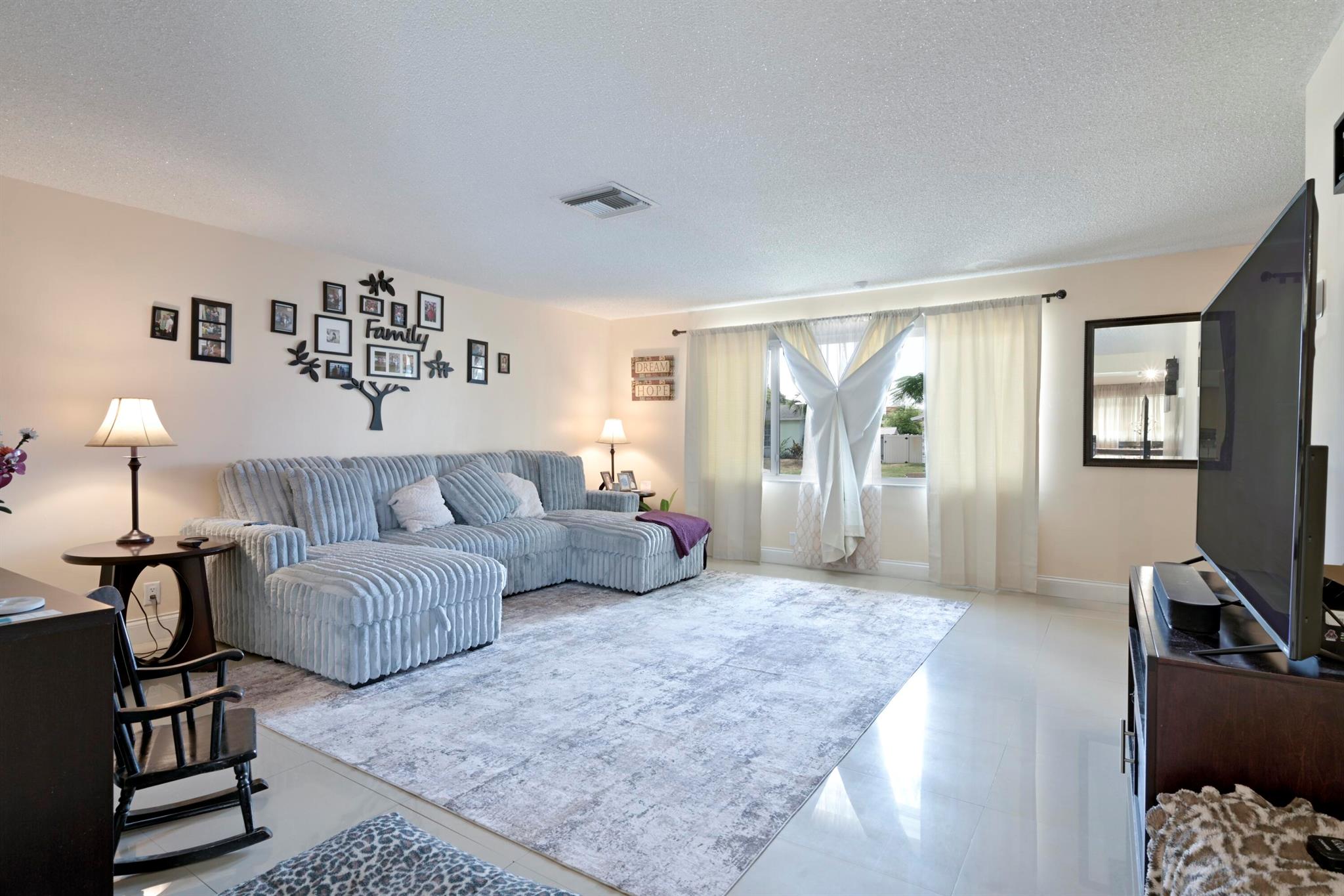 Welcome to your new home, a generous 4 bed, 3 bath home situated in the Village of Palm Springs with NO HOA! This property features hurricane impact windows and doors, including the garage door, ensuring enhanced security, peace of mind and reduced insurance costs! Recent improvements comprise a newer AC (2022), a newly installed fence around the property (2023), updates to 2 out of 3 showers in baths, comprehensive electrical work completed throughout the home (2019), a brand new refrigerator purchase just months ago, and a roof that is only 9 years old!! Come and relish in the expansive yard this home has to offer! Tons of room for a pool, toys and pets to roam around! Great location!! Come check it out today before its gone!