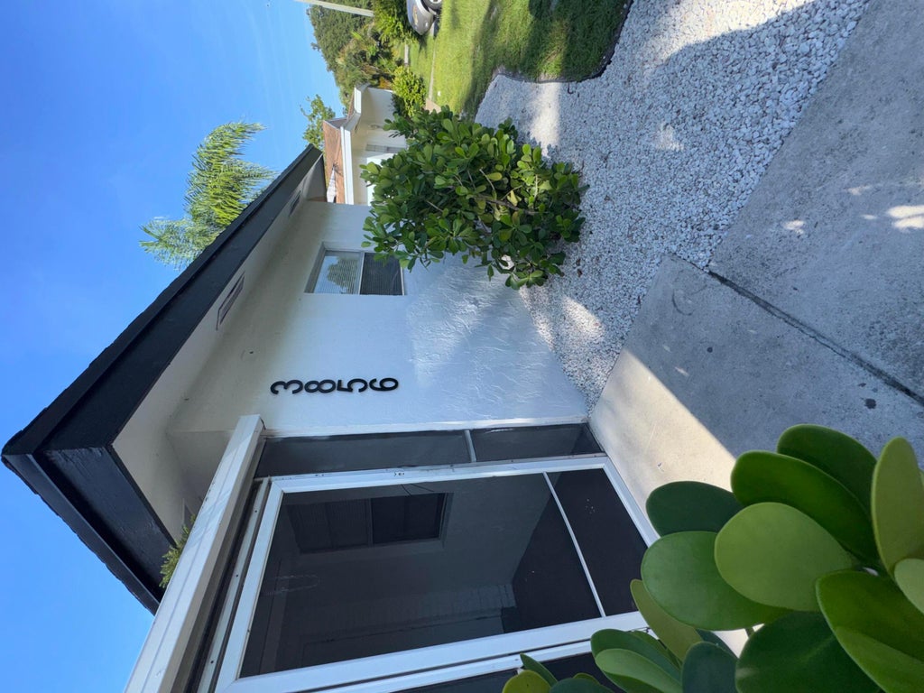 Photo of 3856 Van Cott Street #3856, West Palm Beach, FL 33403 (MLS # B26063216)