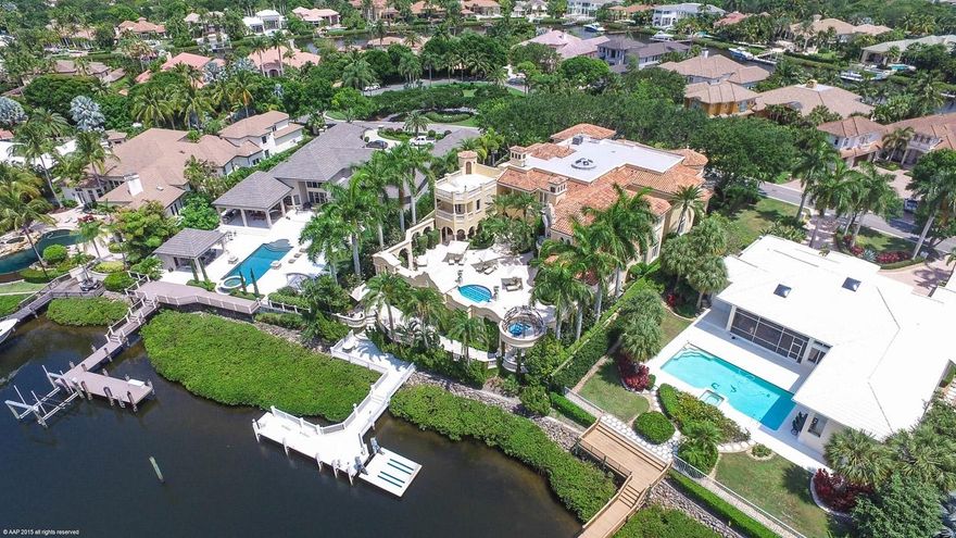 Palatial Waterfront Estate - An Architectural Dream, Grandeur at every corner. The home has 9 bedrooms, 11 full and 3 half baths, built, finished and decorated with the finest of everything.It is being offered furnished with an exclusion list available. First Floor exquisite  master suite envelopes you in the ultimate of luxurious living with his and her closets, bathrooms, offices, and even an extra slumber room. 7 guest suites all with full baths and each one has an individual flair.  The features in this home are endless with handpainted sinks, stained glass dome skylight, 5 fireplaces, some of the most intricate crown moldings available, custom marble and wood inlaid floors, full house generator, theatre and much more. This home is truly a one of kind must see property.