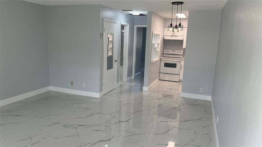 Newly renovated 1 bedroom apartment in Triplex.  Brand new white kitchen with quartz countertops, fully updated bathrooms, porcelian tile throughout and freshly painted.  Ceiling fan in bedroom.  Washer/dryer hook up in storage room for laundry inside unit, if desired. Close to 95. Lots of shopping and restaurants within walking distance.