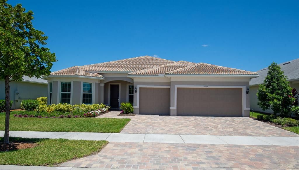 Photo of 12977 SW Aureolian Lane, Port St Lucie, FL 34987 (MLS # R10906056)