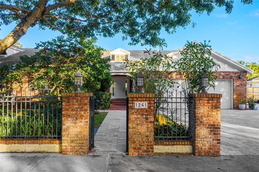 This spectacular oversized property is located on the most coveted street in the exclusive Fort Lauderdale neighborhood of Rio Vista. Set on over 100' of waterfront on the protected Tarpon River and just minutes to Port Everglades ocean access, this property is ideal for the avid yachtsman. 1241 N Rio Vista Blvd is located at one of the highest elevations in Rio Vista preventing flooding issues from the King Tides. The red brick, traditional main house, features a split floor plan with 4 bedrooms and 4 bathrooms. There is also a spacious, beautifully appointed separate guest/in-laws quarters, constructed of poured concrete walls, located on the property. The home features a natural gas fireplace, an outdoor firepit, and gas water heaters and dryer. Also has a well for irrigation.