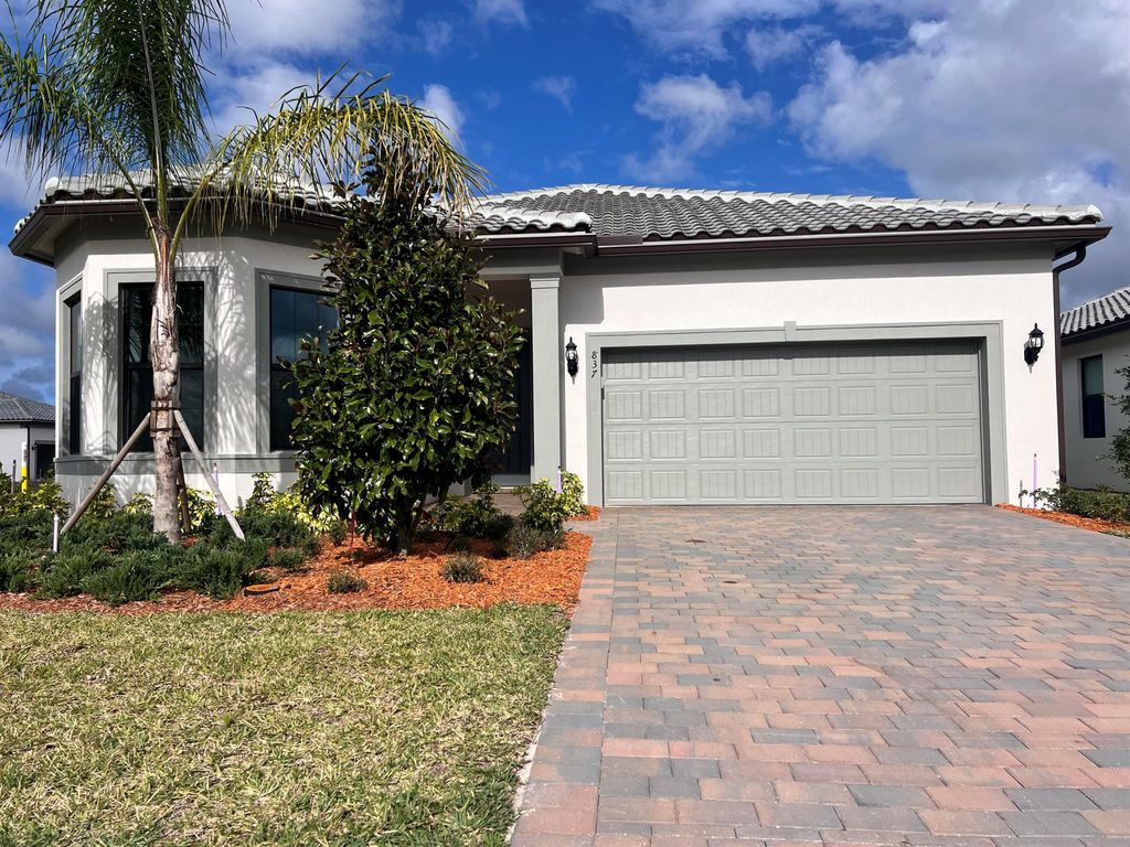 Photo of 837 SE Courances Drive, Port Saint Lucie, FL 34984 (MLS # R10966151)