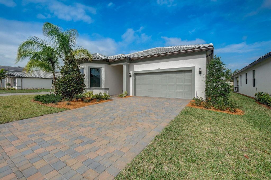Photo of 837 SE Courances Drive, Port Saint Lucie, FL 34984 (MLS # R10966151)