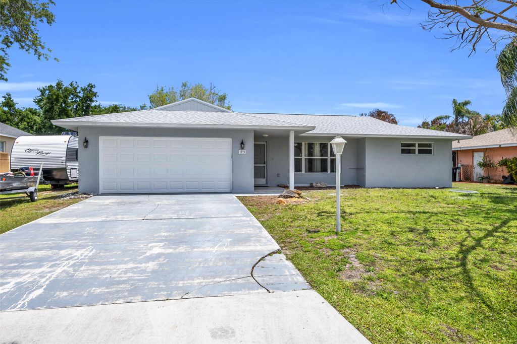 Photo of 1333 SE Bayharbor Street, Port Saint Lucie, FL 34983 (MLS # B26020087)