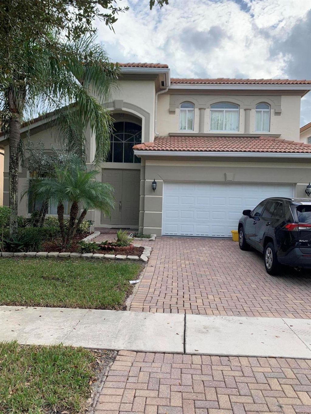 Photo of 296 Gazetta Way, West Palm Beach, FL 33413 (MLS # R11148831)
