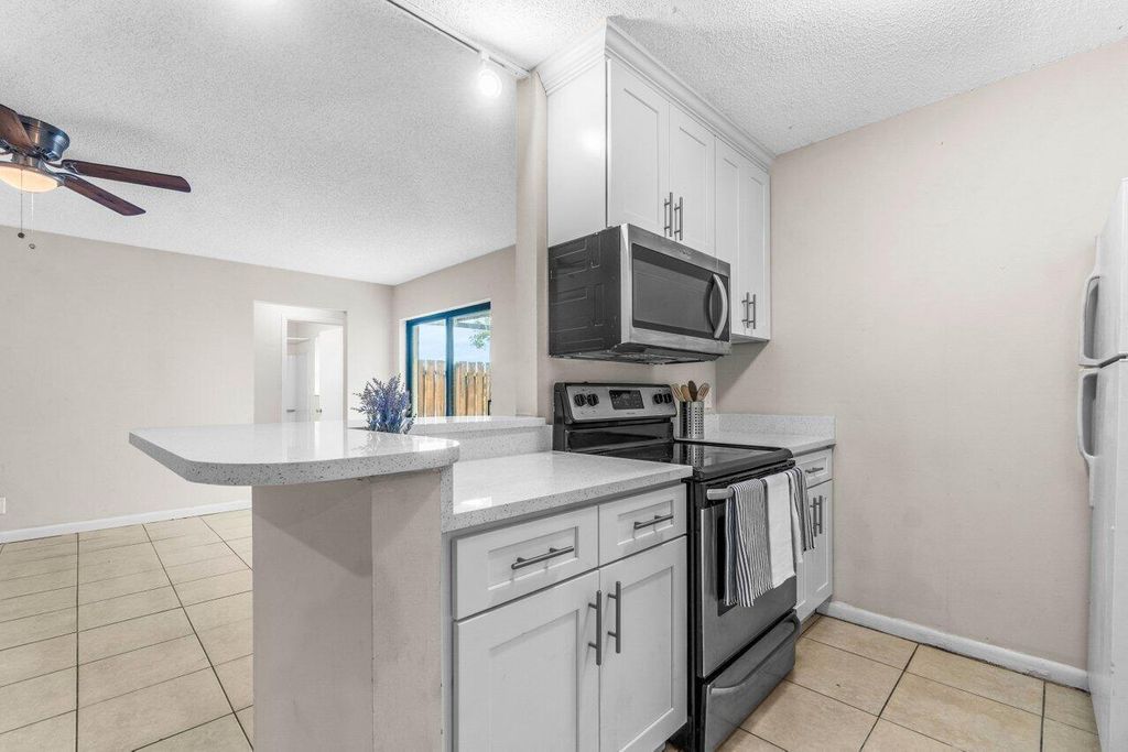 Photo of 16 Crossings Circle #D, Boynton Beach, FL 33435 (MLS # R11162291)