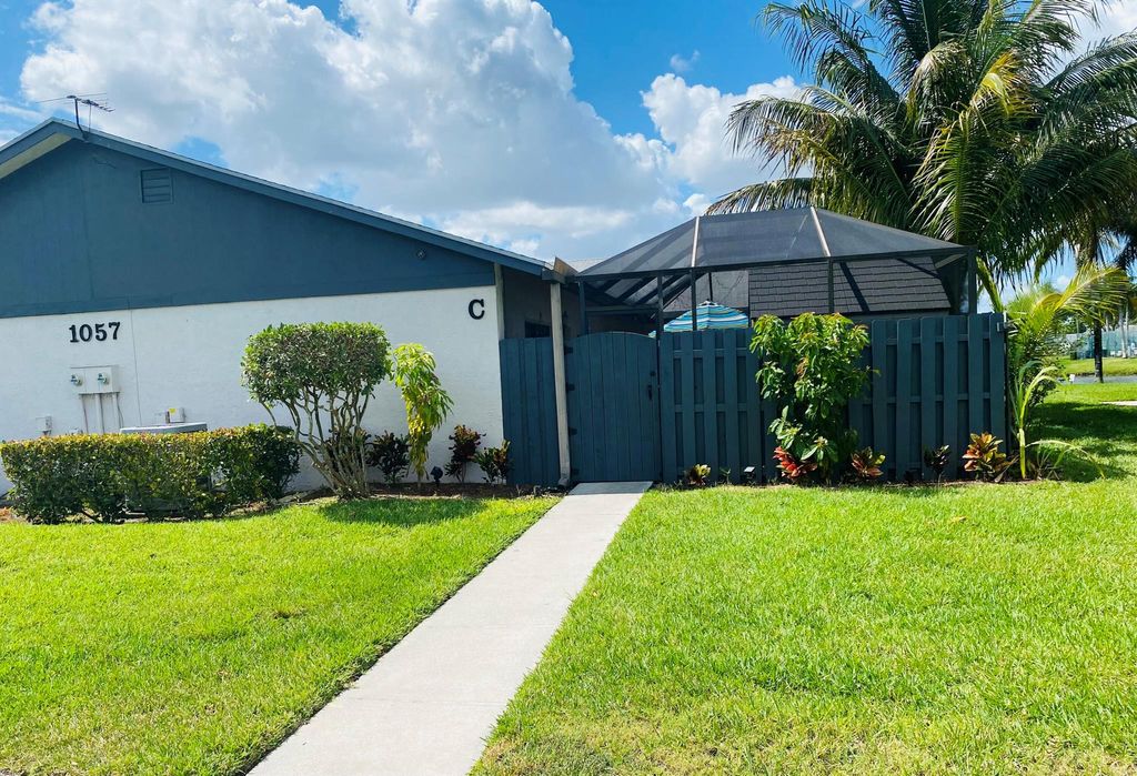 Photo of 1057 N Summit Trail Circle #C, West Palm Beach, FL 33415 (MLS # R11124868)