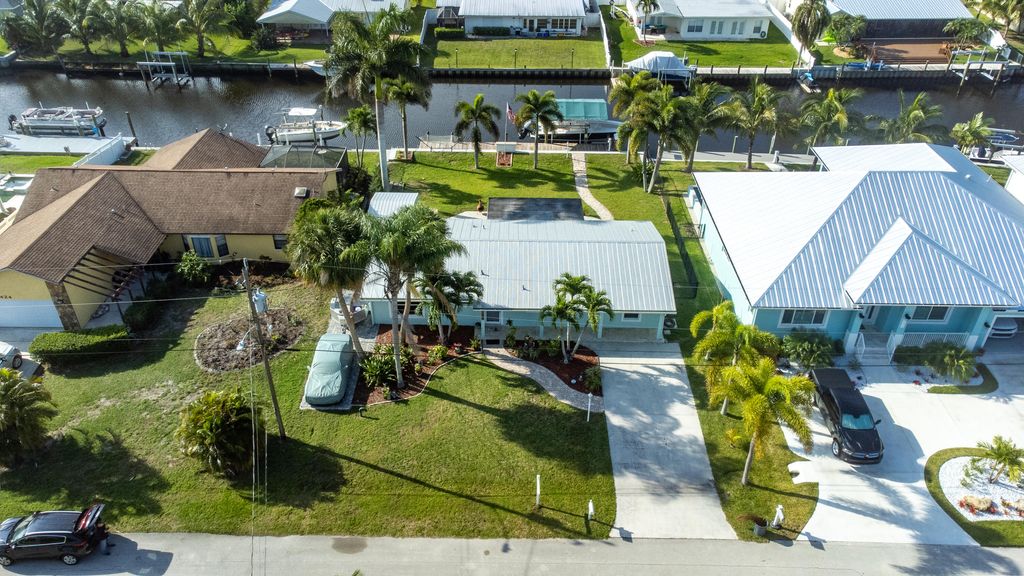 Photo of 1434 SW Egret Way, Palm City, FL 34990 (MLS # R10883781)