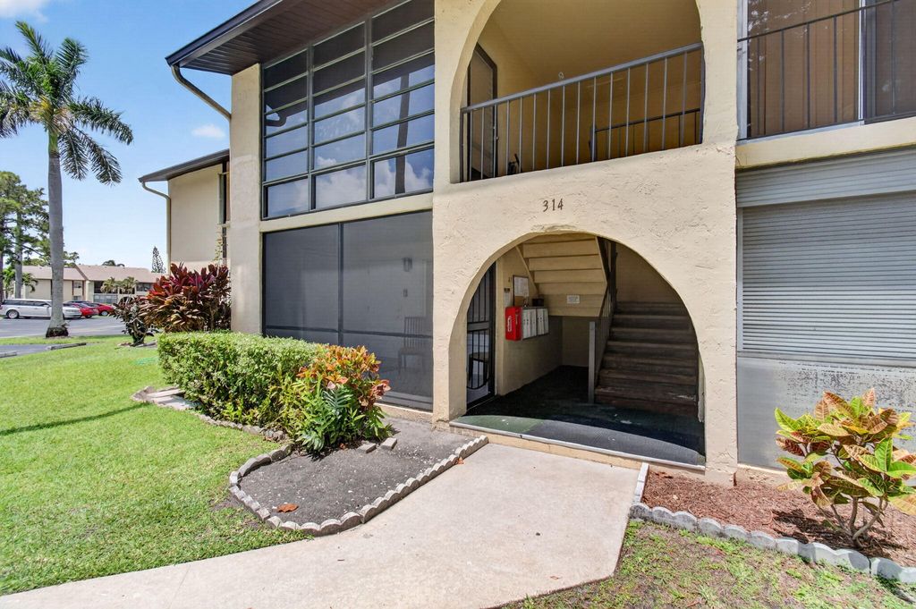 Photo of 314 Pine Ridge Circle #A1, Greenacres, FL 33463 (MLS # B26021419)