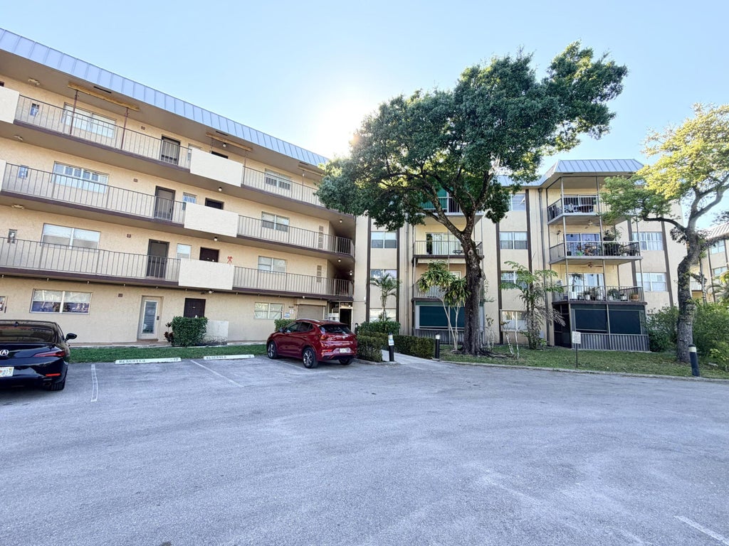 Photo of 6260 S Falls Cir Drive #201, Lauderhill, FL 33319 (MLS # B26082802)