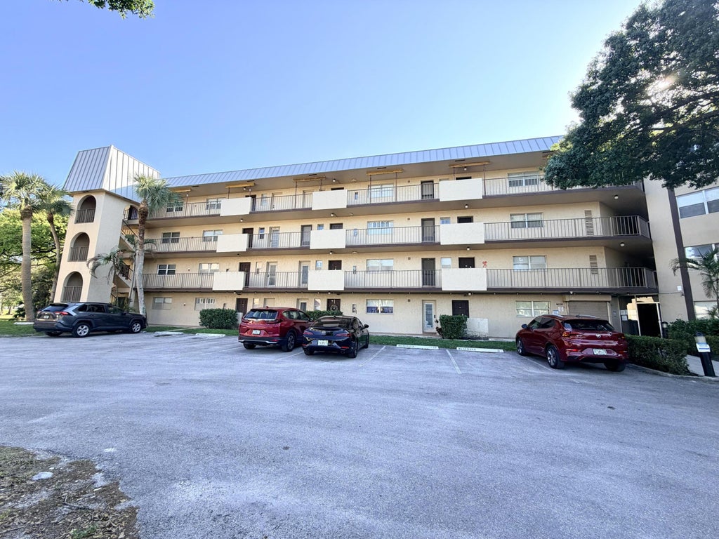 Photo of 6260 S Falls Cir Drive #201, Lauderhill, FL 33319 (MLS # B26082802)