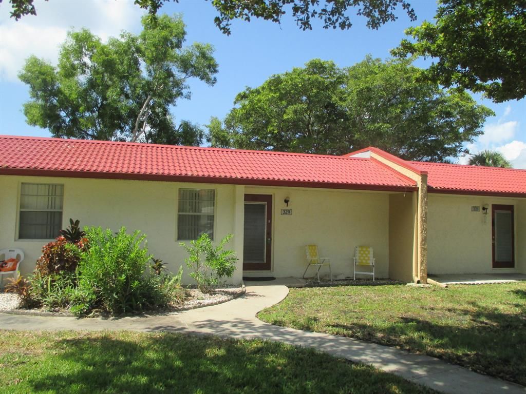 Photo of 329 Lake Evelyn Drive, West Palm Beach, FL 33411 (MLS # R10743810)