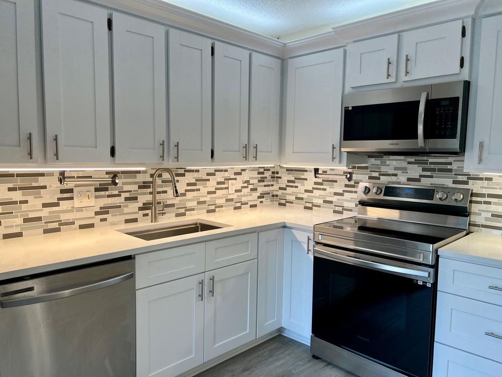 Photo of 1513 15th Terrace, Palm Beach Gardens, FL 33418 (MLS # R10964984)