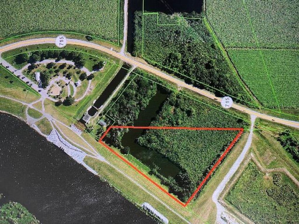 Photo of 715 N State Road 715, Belle Glade, FL 33430 (MLS # R10914161)