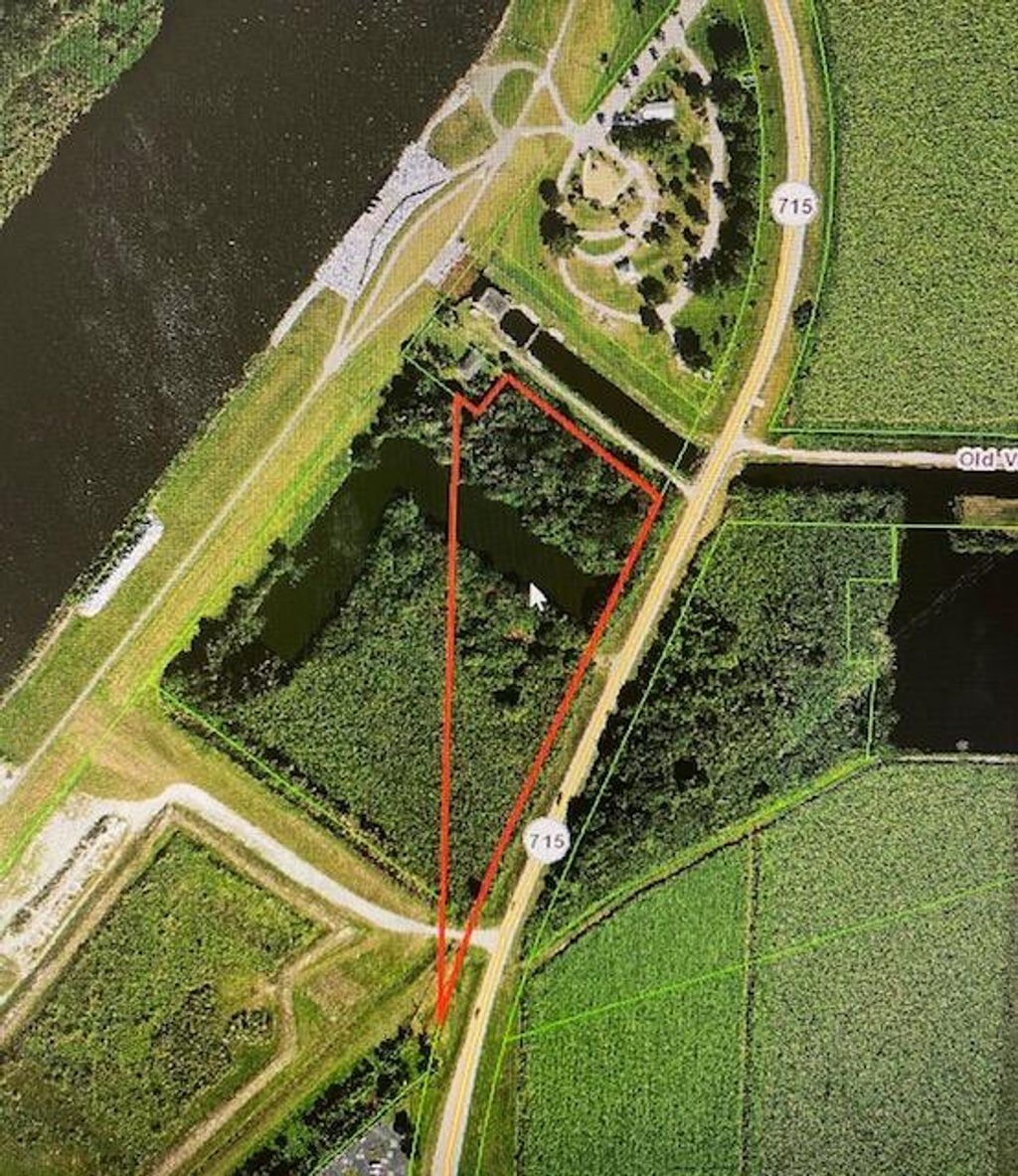 Photo of 715 N State Road 715, Belle Glade, FL 33430 (MLS # R10914161)