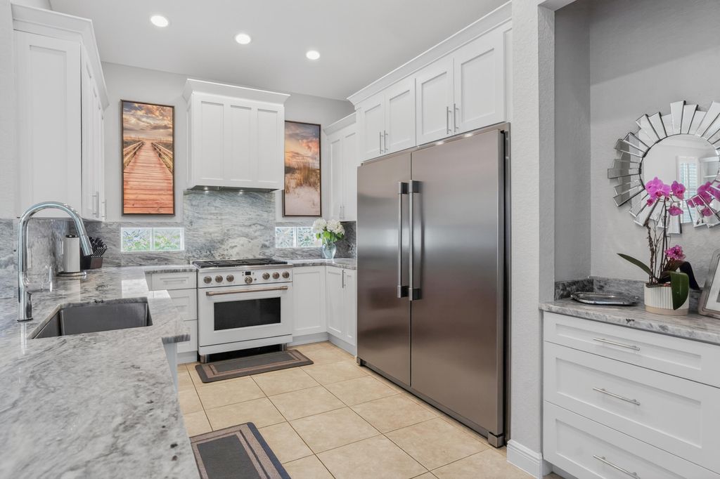 Photo of 150 Santiago Drive, Jupiter, FL 33458 (MLS # B26023427)