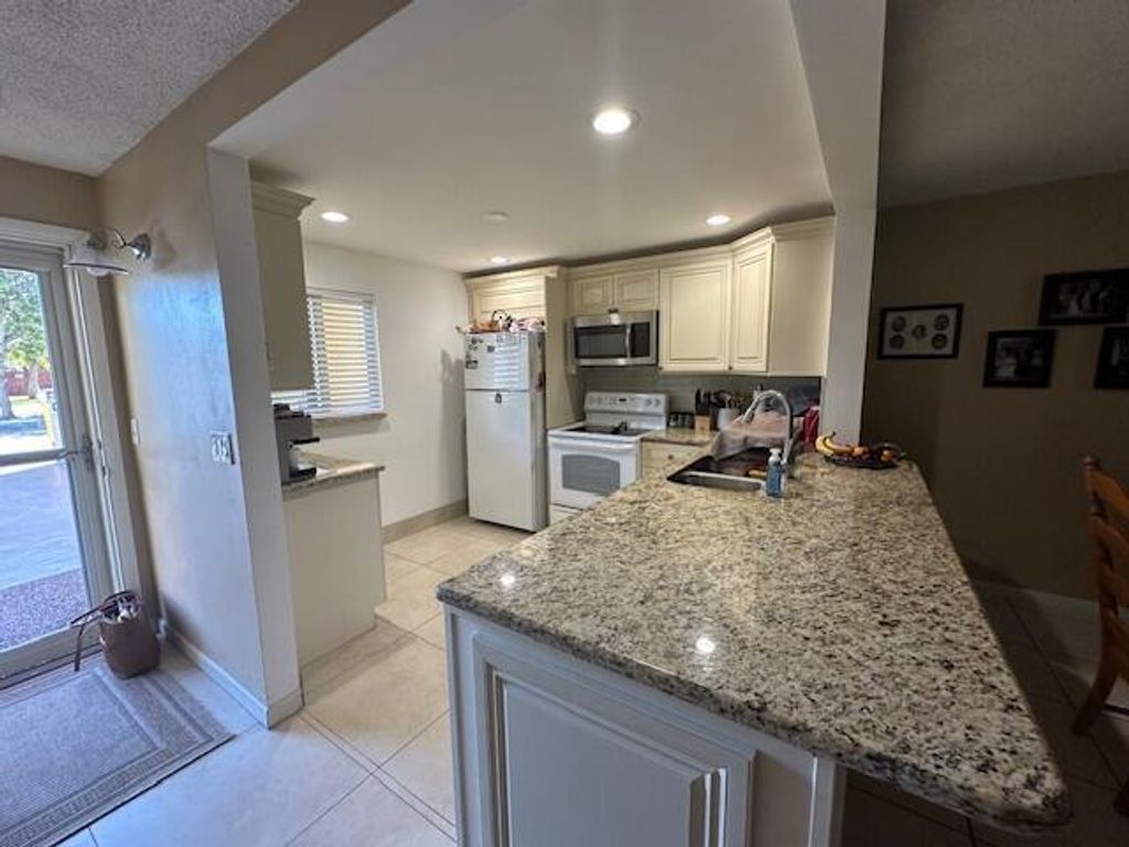 Photo of 2615 NE 3rd Court #112, Boynton Beach, FL 33435 (MLS # R11077704)