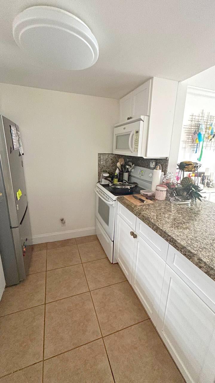 Photo of 6347 LA COSTA Drive #D, Boca Raton, FL 33433 (MLS # B26064528)