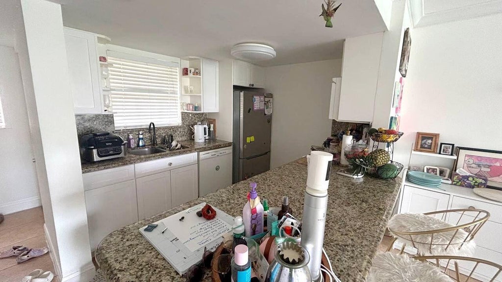 Photo of 6347 LA COSTA Drive #D, Boca Raton, FL 33433 (MLS # B26064528)