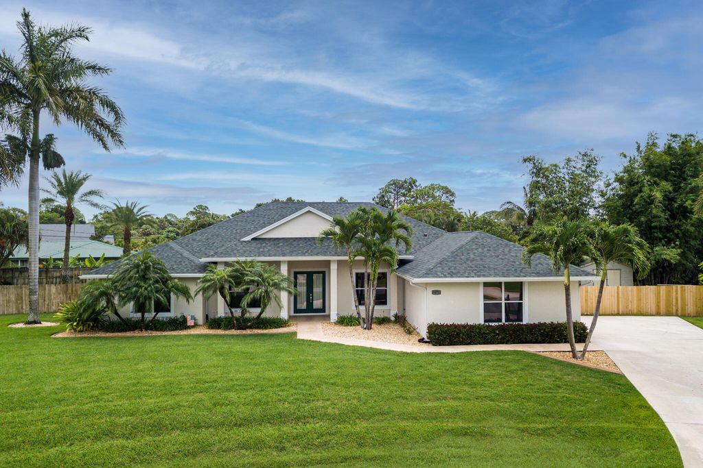 Photo of 1871 SE Adair Street St, Port Saint Lucie, FL 34952 (MLS # R10808438)