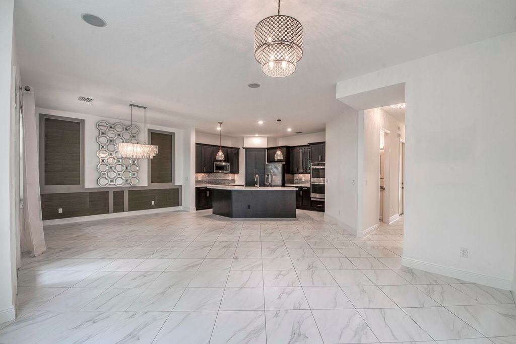 Photo of 1036 Piccadilly Street, Palm Beach Gardens, FL 33418 (MLS # R11063547)