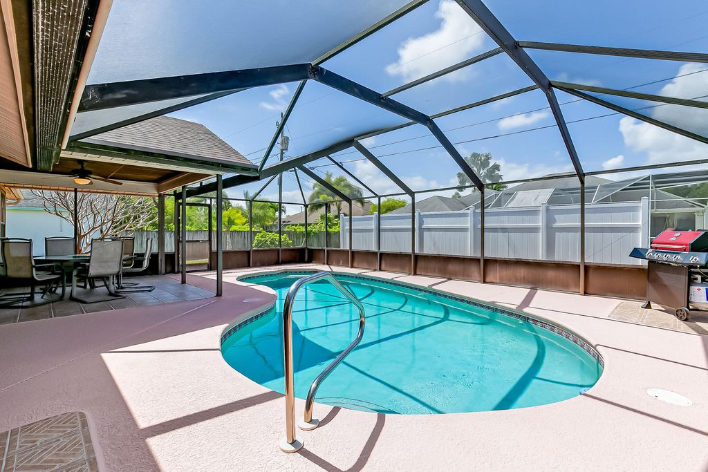 Photo of 6819 NW Dragon Street, Port Saint Lucie, FL 34983 (MLS # R10972610)