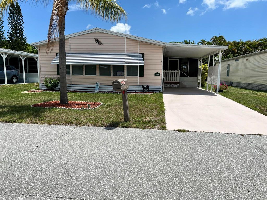 Photo of 6664 Spanish Lakes Boulevard, Fort Pierce, FL 34951 (MLS # R10994778)