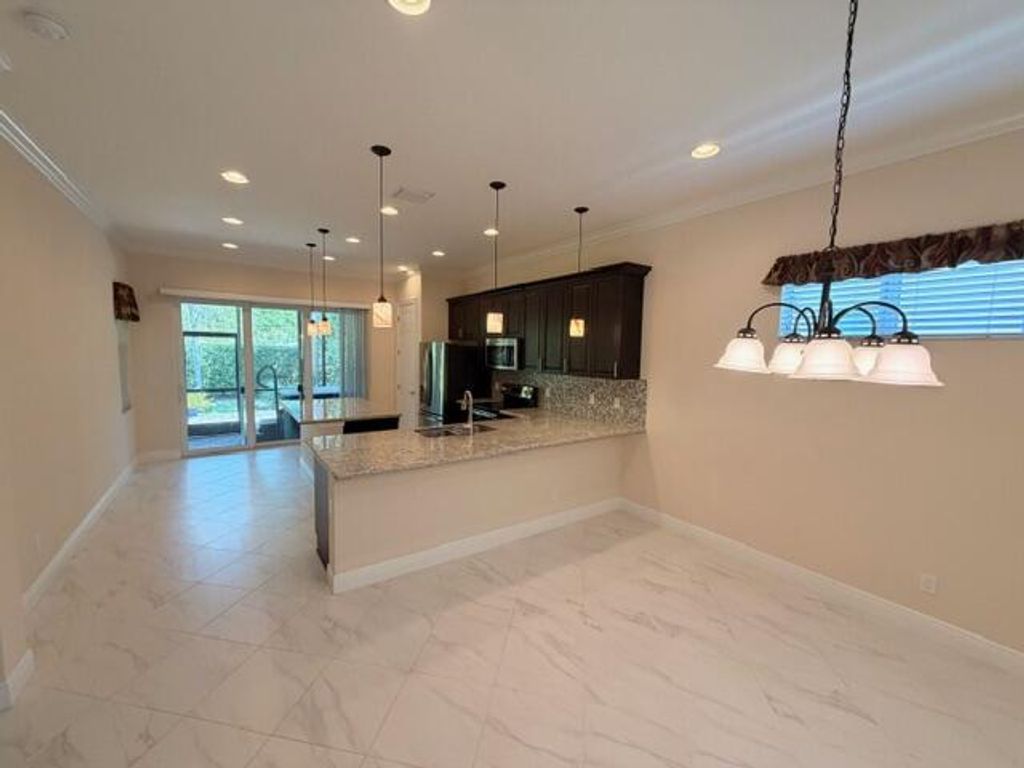 Photo of 11147 SW Visconti Way, Port Saint Lucie, FL 34986 (MLS # B26008094)