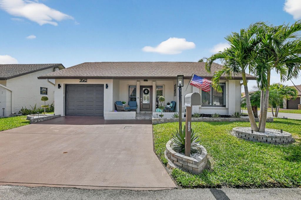 Photo of 2062 SW 15th Place, Deerfield Beach, FL 33442 (MLS # F10553995)