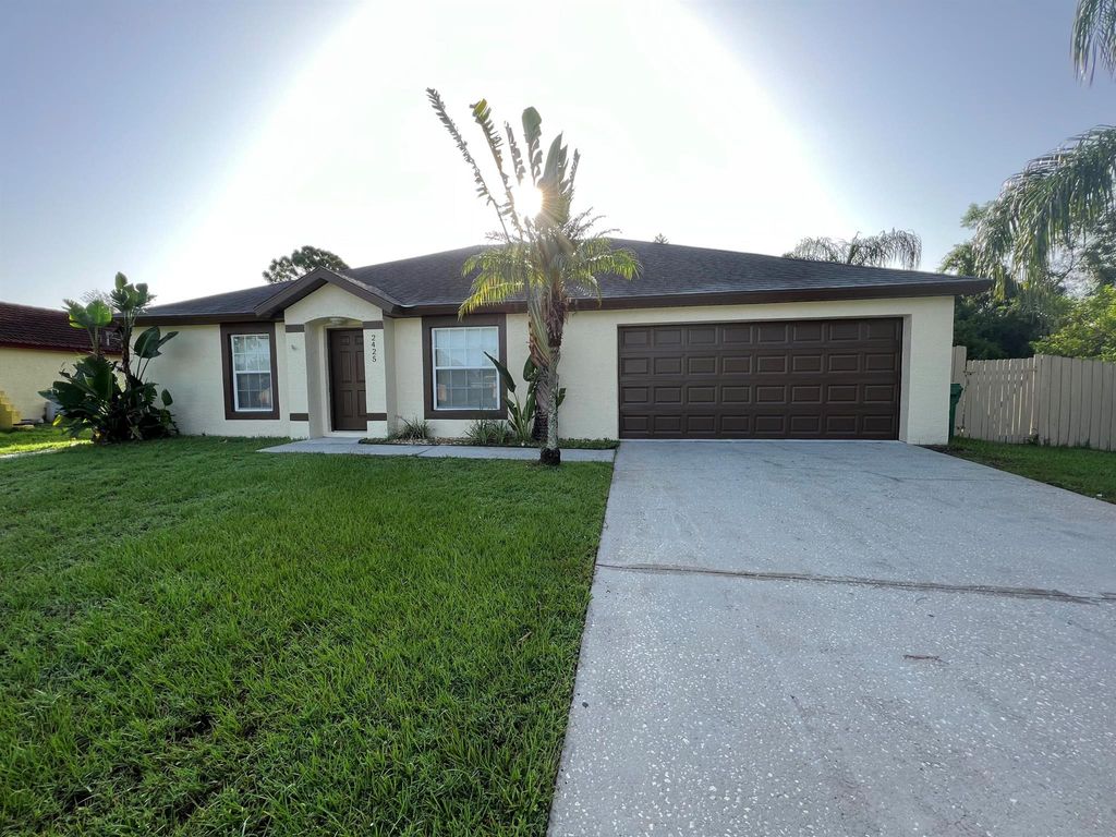 Photo of 2425 SW Summit Street, Port St Lucie, FL 34984 (MLS # R10906583)