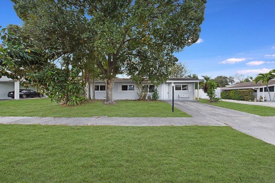Welcome to your new home! Beautiful 4 bedroom 2 bath with spacious fenced yard. **Master bed can also be used as mother-in-law unit with its own bath and separate entrance.** Conveniently located 2 miles away from the beach, walking distance to shopping centers, great schools, and Kayak land. Central A/C System, impact windows, kitchen featuring soft closing cabinets and brand new stainless steel appliances. washer&dryer.