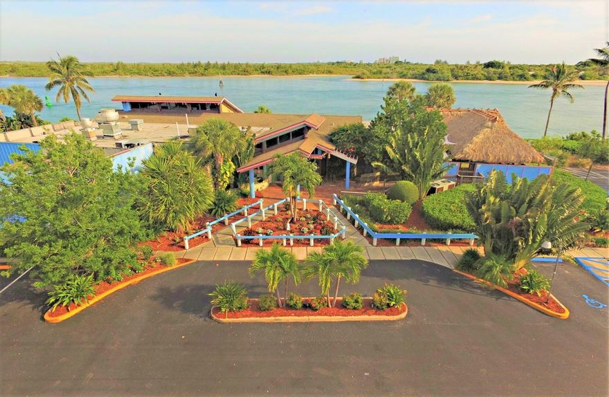 Price Adjusted to Fit the Market! Manatee Island Bar & Grill is a 7,140+/- SF, high-volume 285+/- seating capacity, waterfront restaurant situated along the Fort Pierce Inlet. The property includes 1.7+/- acres of land and boasts uninterrupted views of the water.  The restaurant has indoor and outdoor dining areas, an indoor bar, an outdoor Tiki Bar, lush tropical landscaping, and a repaved parking lot with 120+/- delineated parking spaces.  The building is made of concrete block, has spacious cathedral ceilings supported by decorative interior beams, and includes hurricane-impact glass. This is a well-maintained turn-key restaurant that is easy to manage and operate. Complete books, records, financials, and tax returns available with signed NDA.