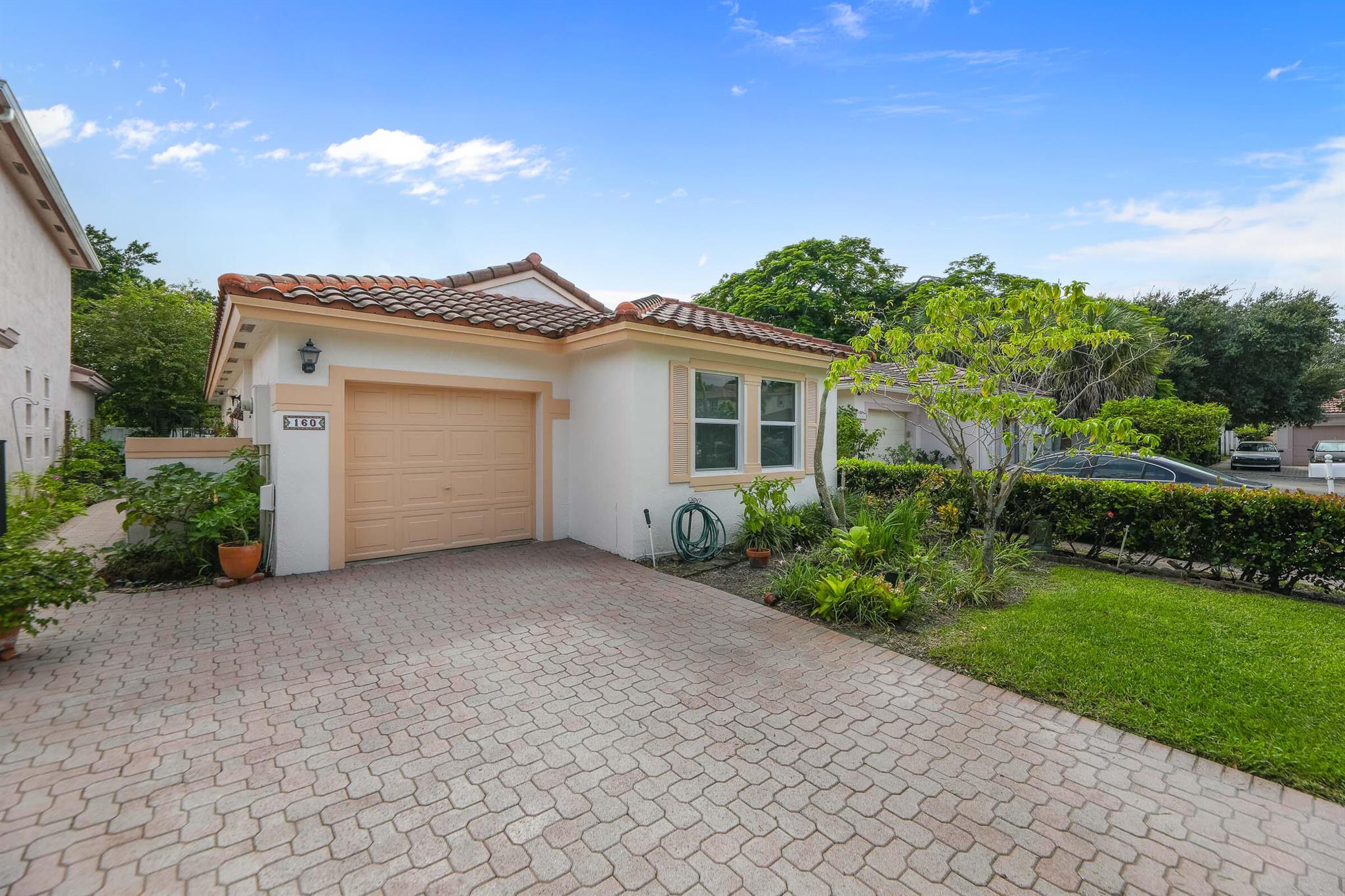 This well-maintained 2-bed, 2-bath Plantation home features two master suites with private baths, perfect for flexible living. Enjoy peace of mind with impact windows & doors, a 4-year-old roof, 2-year-old water heater, and an 18-month-old AC. The kitchen offers ample cabinet space, ready for your customization. Bright, open living/dining area. Ideally located near shopping, dining, parks, hospitals, and major highways.