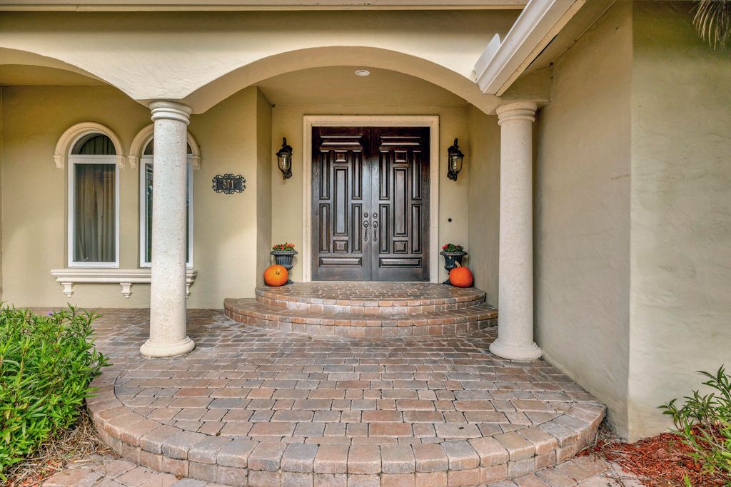 Photo of 571 SW Sanctuary Drive, Port Saint Lucie, FL 34986 (MLS # R10942781)