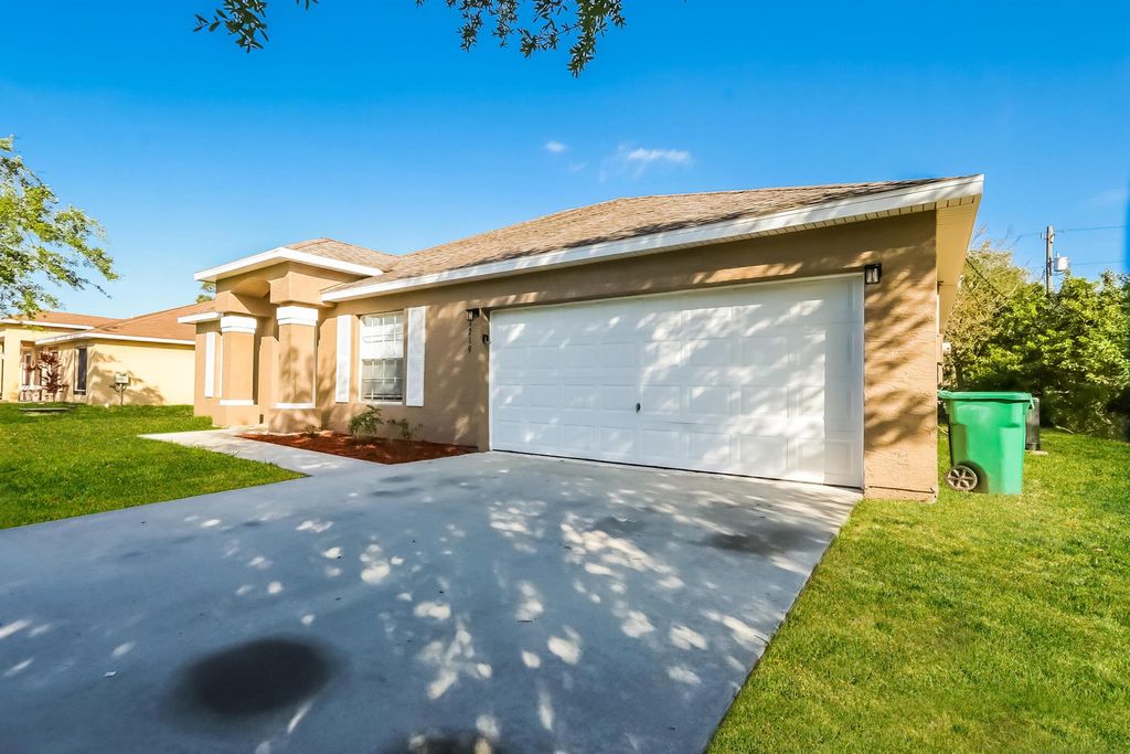 Photo of 1219 SW Eleuthera Avenue, Port Saint Lucie, FL 34953 (MLS # R11025665)