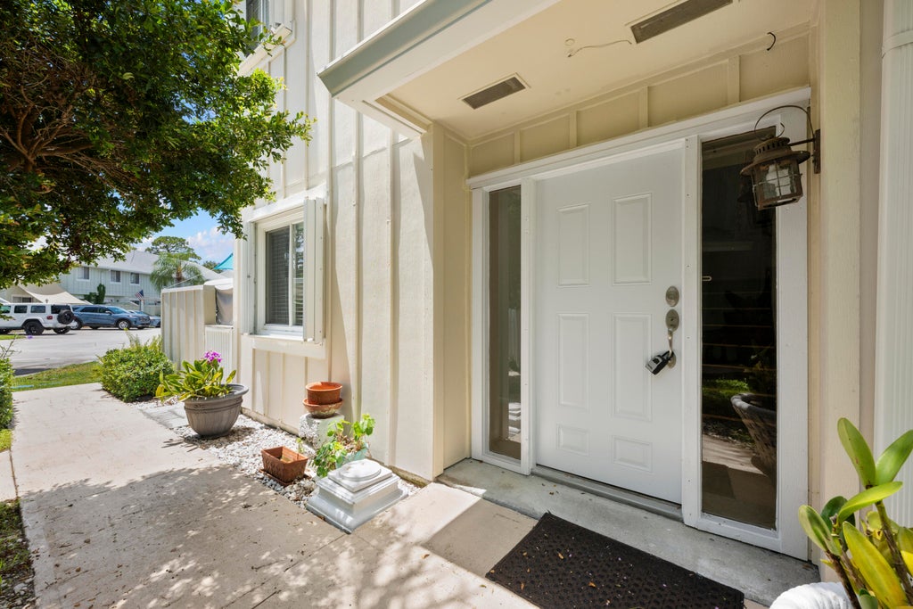 Photo of 6151 Riverwalk Lane #Unit 8, Jupiter, FL 33458 (MLS # B26068263)