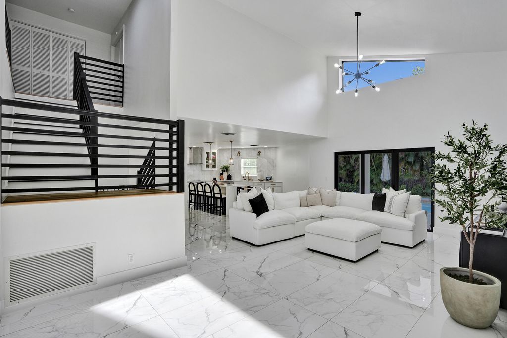 Photo of 861 Mockingbird Lane, Plantation, FL 33324 (MLS # B26002949)