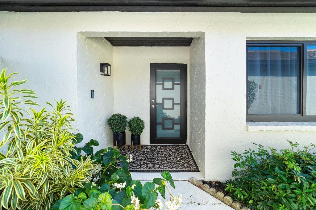 Photo of 69 Ironwood Way, Palm Beach Gardens, FL 33418 (MLS # R11060815)