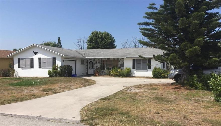 This home is a 3/2 located on a corner lot with huge back yard, near the beach and close to malls and shops. Needs some TLC! Wont Last! This home can be seen anytime, The master bedroom has a tenant and she is available to show it from 9am-5pm only.