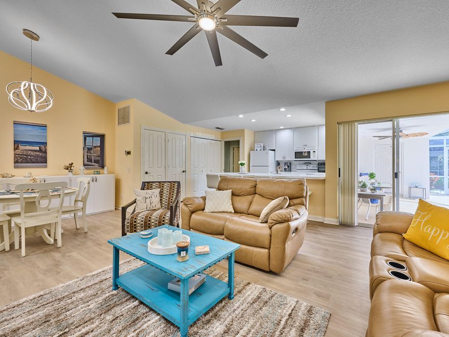 Move-in ready! UPDATED Villa in the Oaks at Sun Terrace. 1,152sf + 2 Beds & 2 Full Baths. Split floor plan and open concept in the living area. NO CARPET, updated ceramic wood look tile flooring through all living areas. Built-in shelving in closets and large built-in wall unit.  Enjoy outdoor living on your private screen enclosed patio, perfect for entertaining with an outdoor storage closet. Located on a quite cul-de-sac in a walk & pet friendly community. Low HOA includes: Basic Cable, Insurance / Roof & Exterior, Lawn Maintenance, Heated Pool, & much more! Parks nearby, Turnpike, I-95, Shops and Dining on PGA Blvd, Gardens Mall, Trader Joe's, and only a short drive to PBI airport, and the area's BEST BEACHES. Call for a private showing.