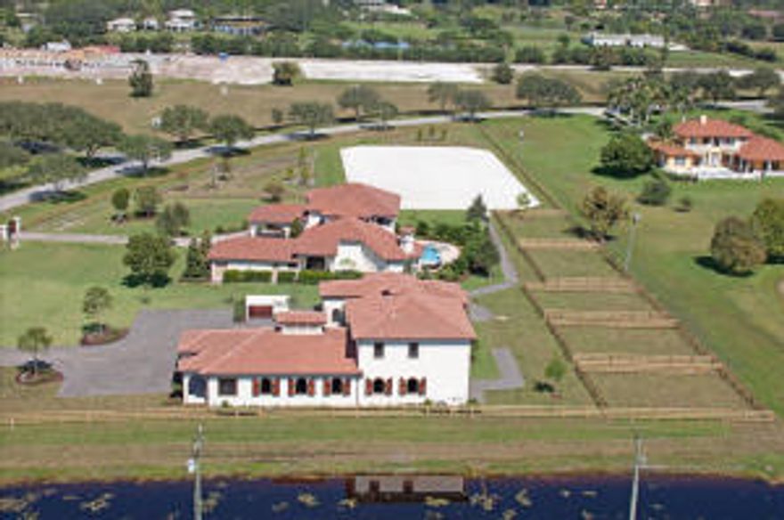 Stunning 5-bedroom, 5-bath pool home in Palm Beach Point. Every part of this property has been upgraded with stainless steel appliances in kitchen, fireplace and breathtaking views. Brand new 12-stall barn custom built by Ventura Builders with a 2-bedroom, 2-bath apartment​. Property has a Wordley Martin 220 x 120 sand ring, 5 paddocks (and room for one more), 2 indoor and 2 outdoor wash racks. The perfect balance between luxury and having a perfectly functional show-farm.