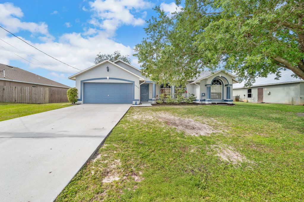 Photo of 5930 NW Theda Lane, Port Saint Lucie, FL 34983 (MLS # B26020635)