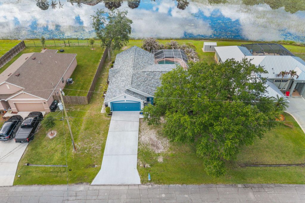Photo of 5930 NW Theda Lane, Port Saint Lucie, FL 34983 (MLS # B26020635)