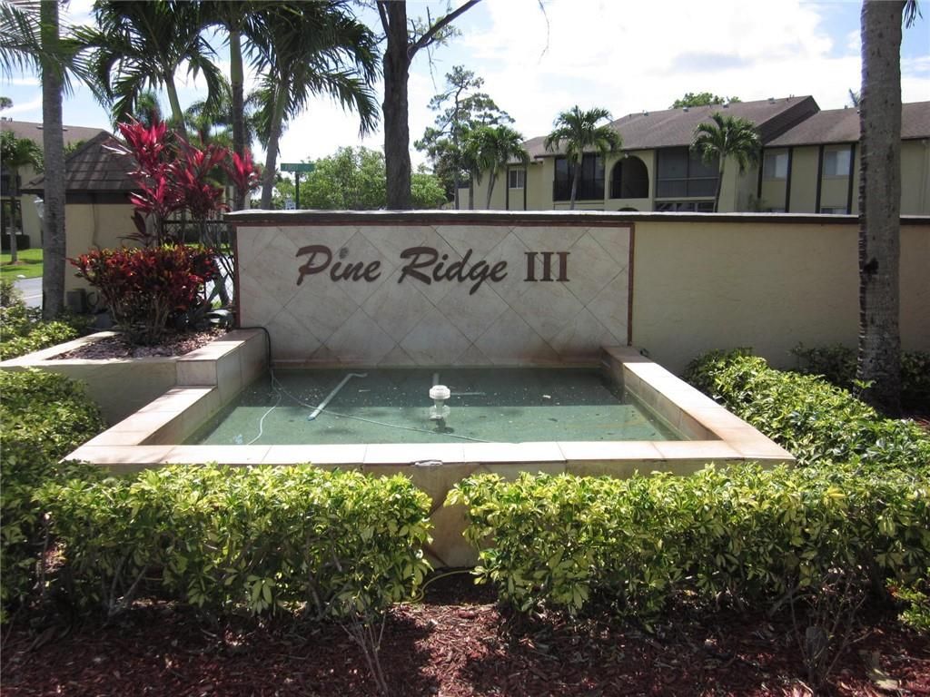 Photo of 302 Pine Ridge Cir #B-2, Green Acres, FL 33463 (MLS # F10293718)