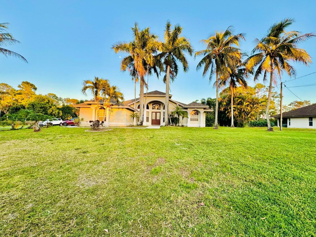 Photo of 6174 Royal Palm Beach Boulevard, The Acreage, FL 33412 (MLS # R10962243)