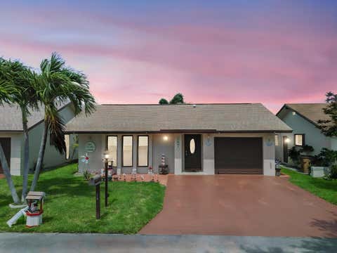 Photo of 1551 SW 22nd Terrace, Deerfield Beach, FL 33442 (MLS # B26036923)