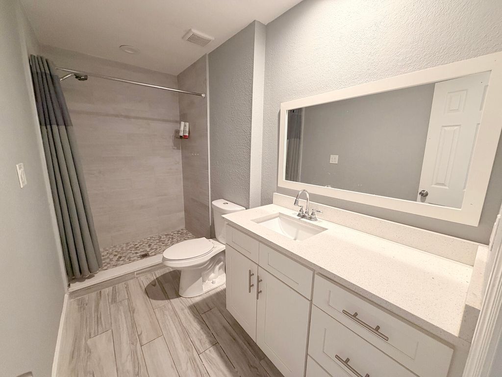 Photo of 1902 SE Gena Road, Port Saint Lucie, FL 34952 (MLS # R11164472)