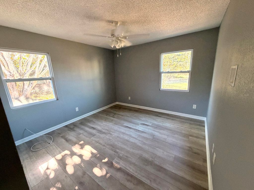 Photo of 1902 SE Gena Road, Port Saint Lucie, FL 34952 (MLS # R11164472)